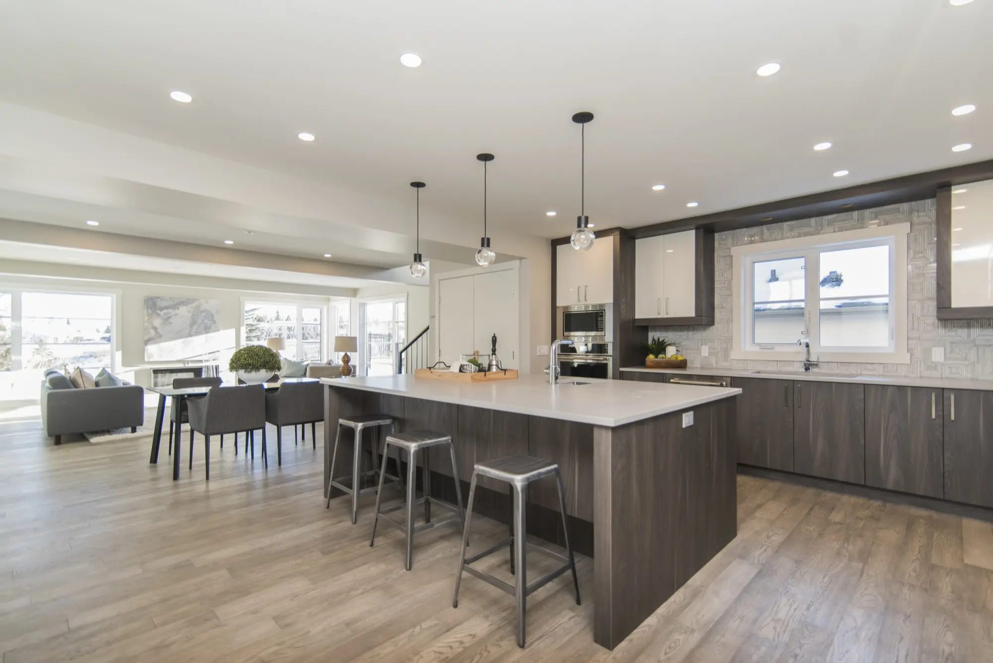 Completed kitchen remodel with wide island and connected dining area