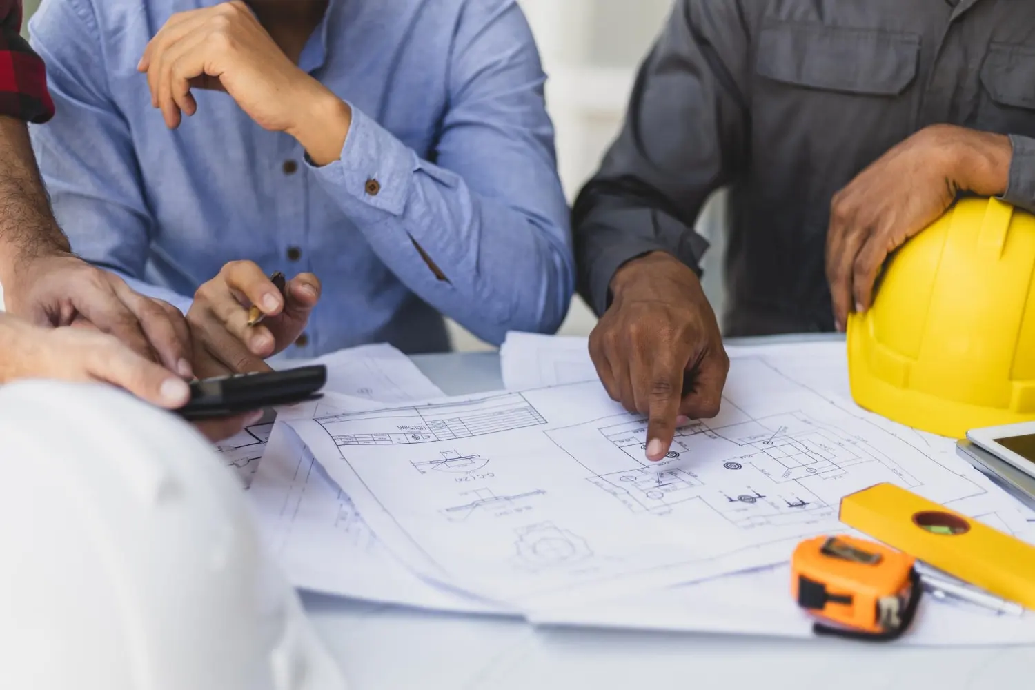 contractor reviewing renovation plans